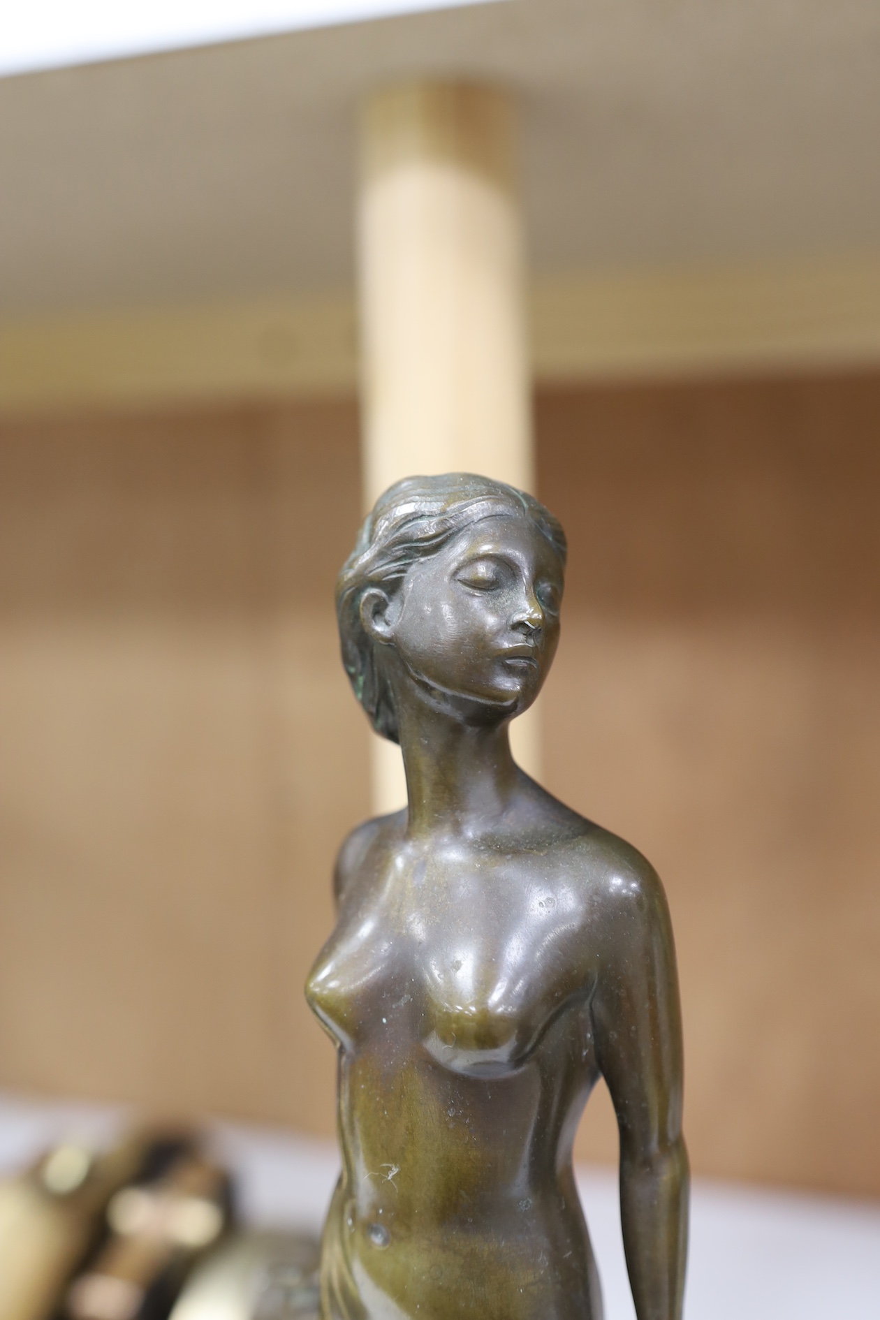 Lissy Eckart (German, 1891-1974), an Art Deco bronze, standing female nude, on marble base, 35cm. Condition - fair to good, chips to marble